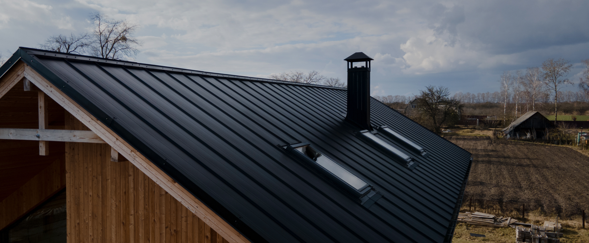 What are the benefits of choosing a metal roof over other roofing materials?